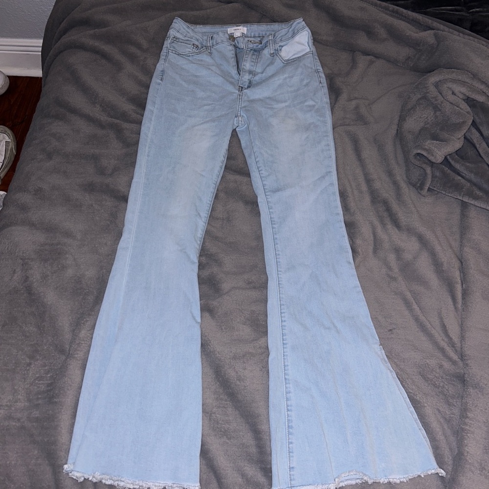 Forever 21 long flared light blue jeans size 26